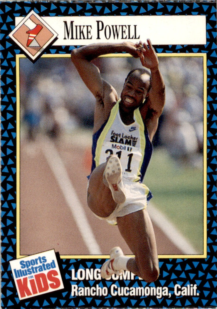 1992 Sports Illustrated for Kids #1 Mike Powell Long Jumping